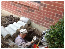 Slab Foundation Repair Dallas, TX, pressed concrete foundation piers