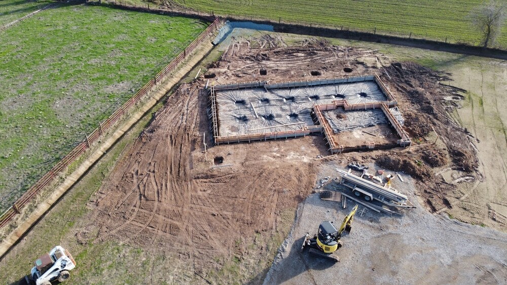 house foundation being built at a ranch